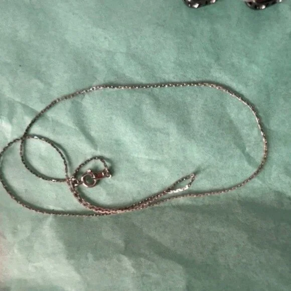 3 pairs of silver tone earrings and a delicate silver chain - Picture 5 of 8